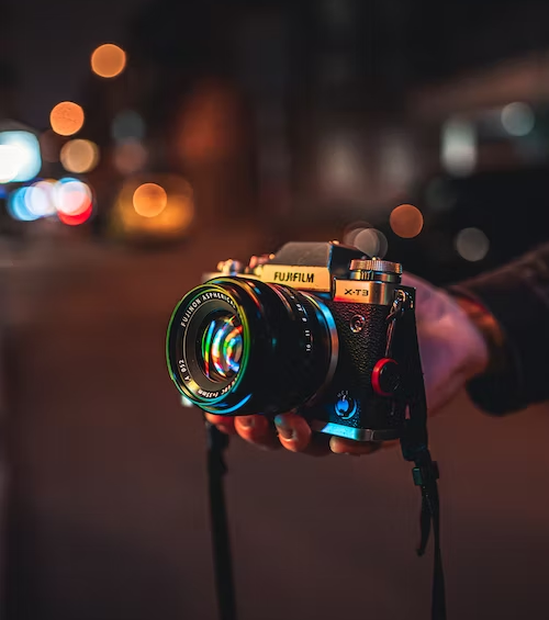 Person holding a camera