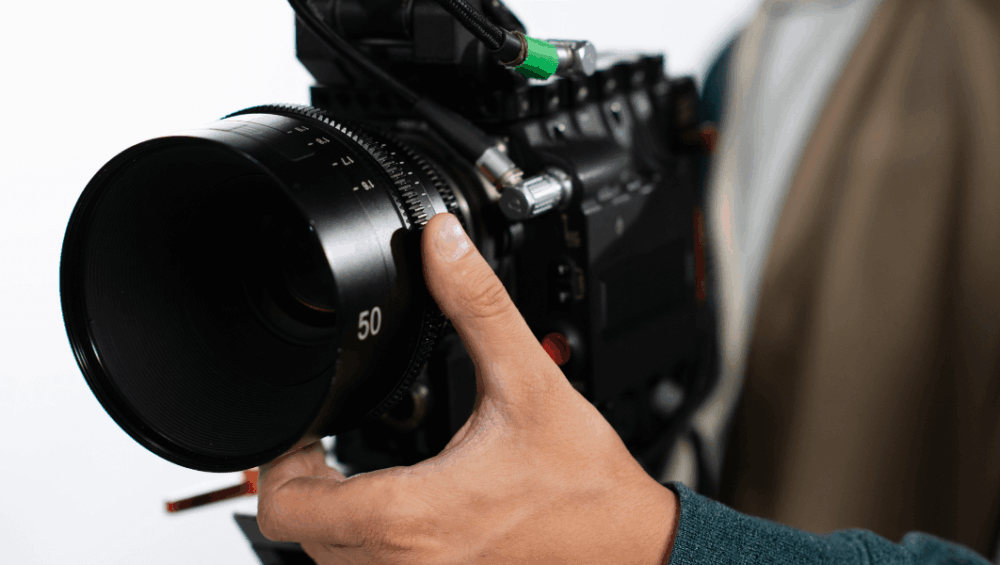 man-filming-with-professional-camera