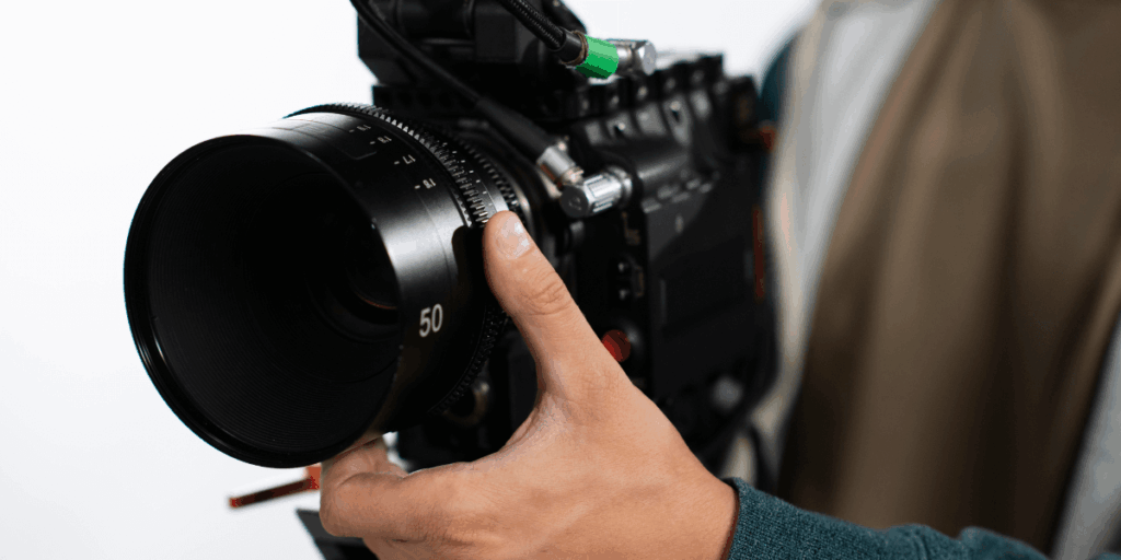 man-filming-with-professional-camera