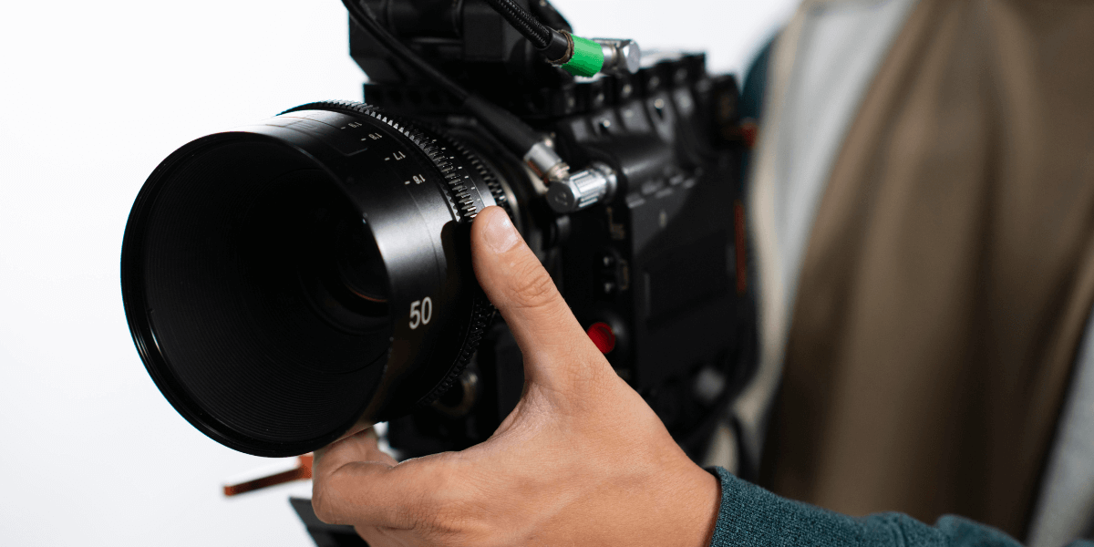 man-filming-with-professional-camera